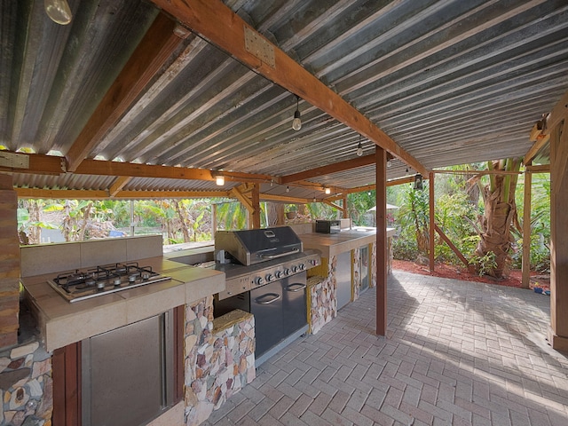 view of patio / terrace with a grill and an outdoor kitchen