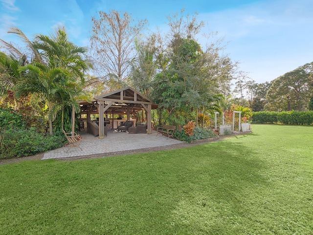 view of yard featuring a gazebo and a patio area