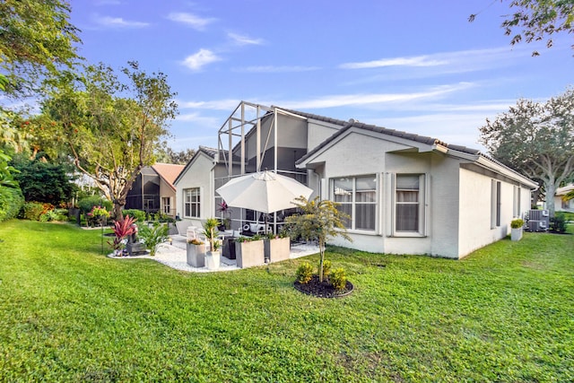 view of property exterior featuring a lawn, cooling unit, a patio area, and a lanai