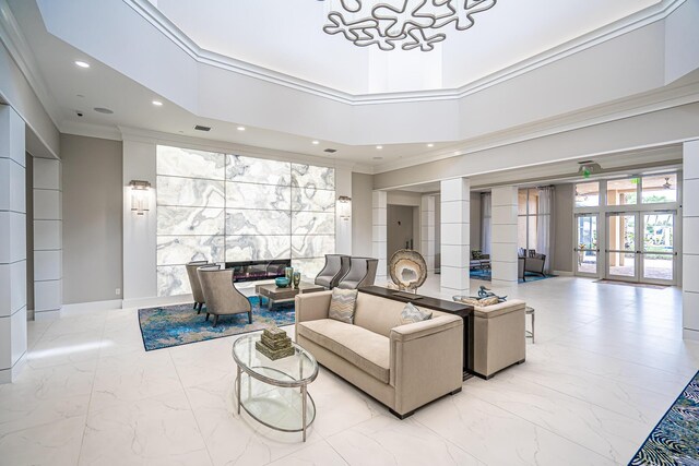 living room featuring crown molding