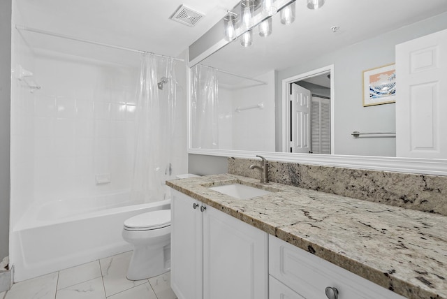 full bathroom featuring toilet, vanity, and shower / tub combo with curtain