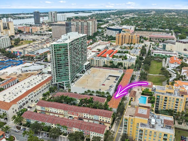 birds eye view of property featuring a water view