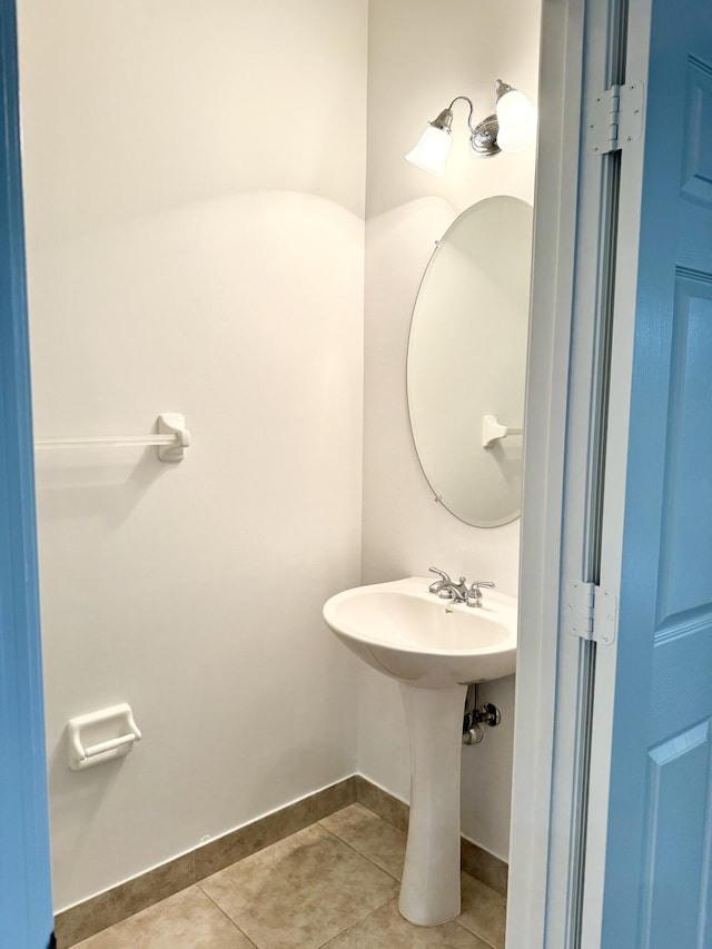 bathroom with tile patterned floors