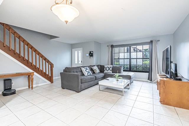 living room featuring light tile patterned flooring