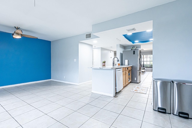 kitchen featuring ceiling fan, sink, stainless steel appliances, and light tile patterned flooring