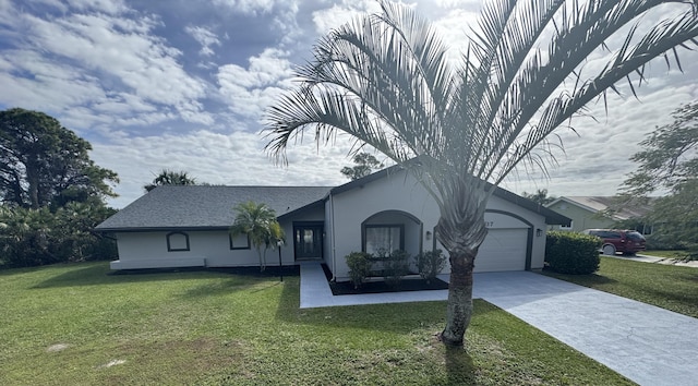 ranch-style house with roof with shingles, stucco siding, a garage, driveway, and a front lawn