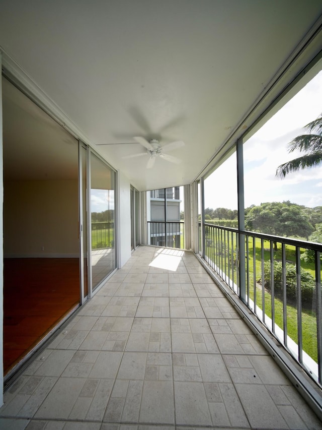 balcony featuring a ceiling fan