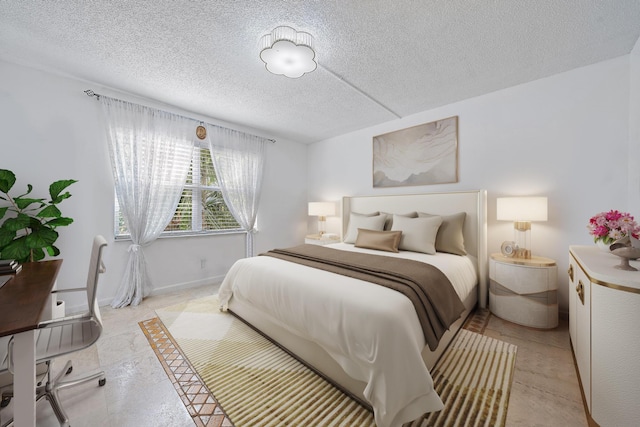 bedroom featuring a textured ceiling