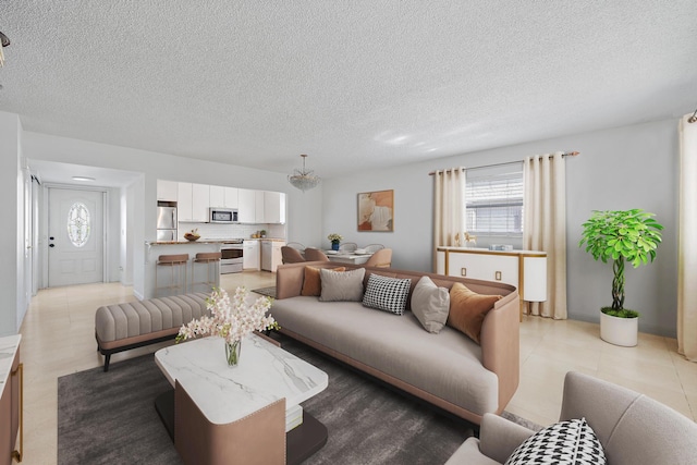 living room featuring a textured ceiling