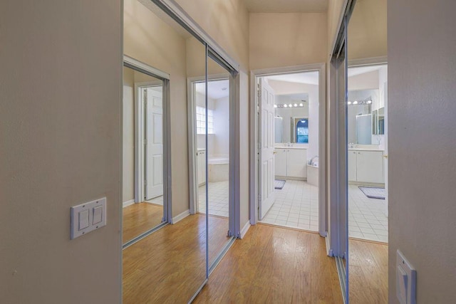 corridor featuring hardwood / wood-style flooring