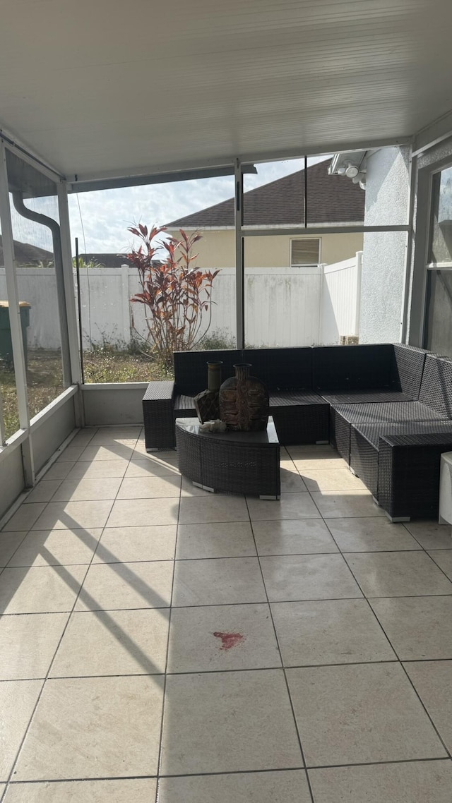 unfurnished sunroom with a healthy amount of sunlight