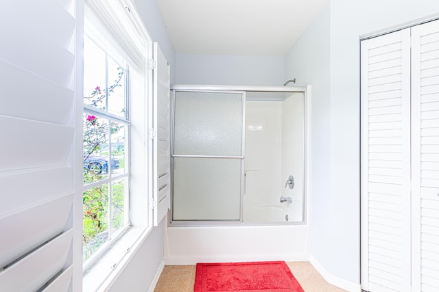 bathroom featuring enclosed tub / shower combo