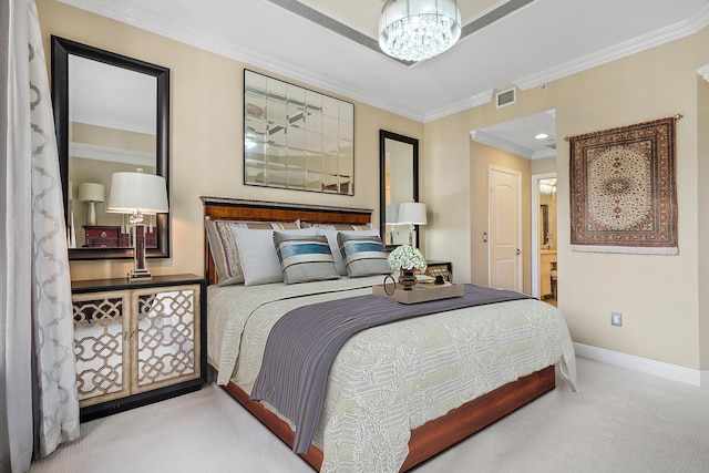 carpeted bedroom with ornamental molding, ensuite bath, and a chandelier