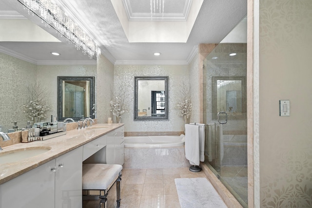 bathroom with plus walk in shower, ornamental molding, tile patterned floors, and vanity