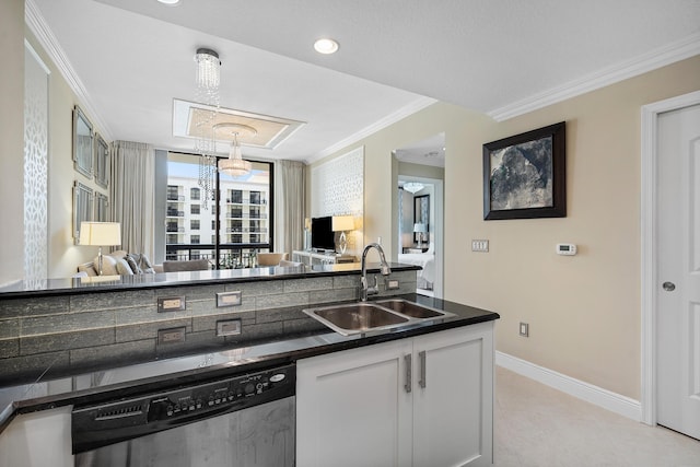 kitchen with light tile patterned floors, decorative light fixtures, stainless steel dishwasher, white cabinets, and sink