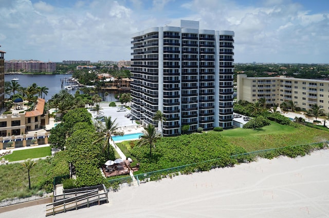 view of building exterior with a water view