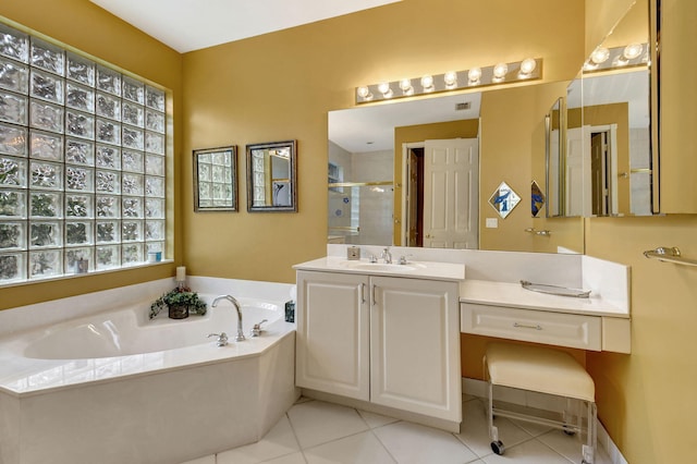 bathroom with independent shower and bath, tile patterned floors, and vanity