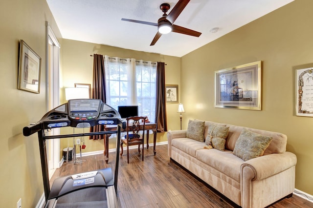 interior space featuring ceiling fan and dark hardwood / wood-style flooring