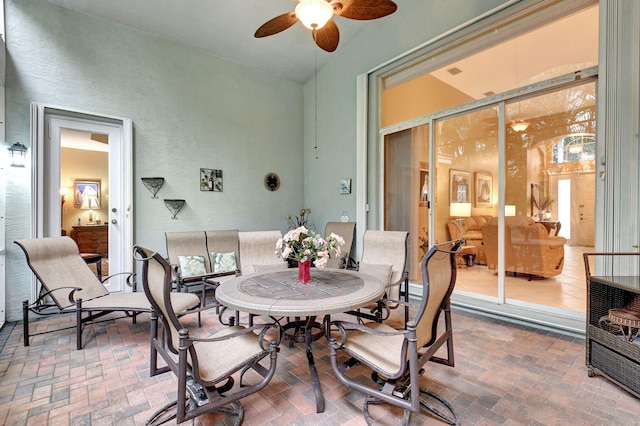 dining space with ceiling fan