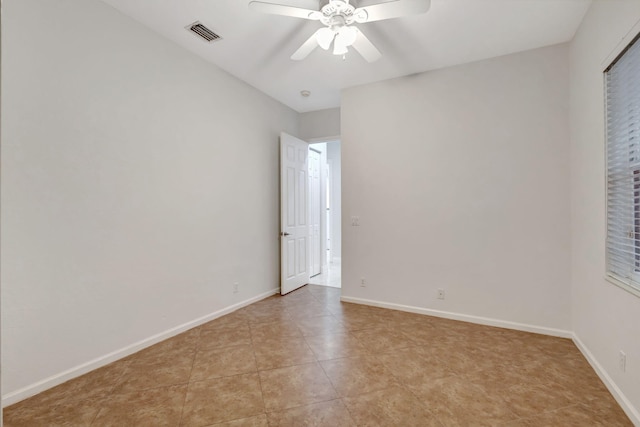 unfurnished bedroom featuring ceiling fan and light tile patterned floors