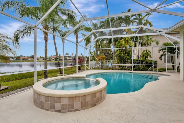 view of swimming pool featuring a lanai, a water view, an in ground hot tub, and a patio