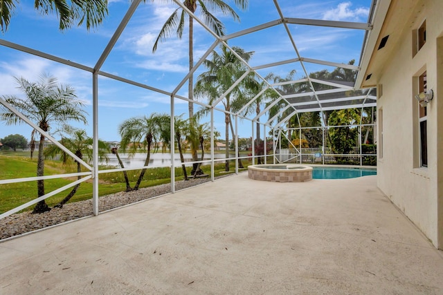 view of swimming pool featuring a patio area, a lanai, an in ground hot tub, and a water view