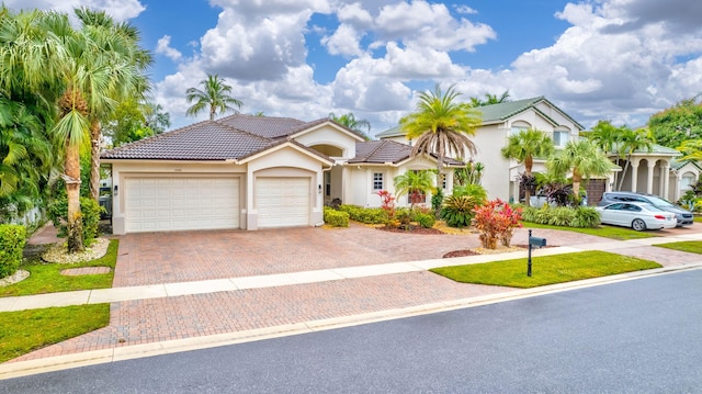 view of front of property featuring a garage