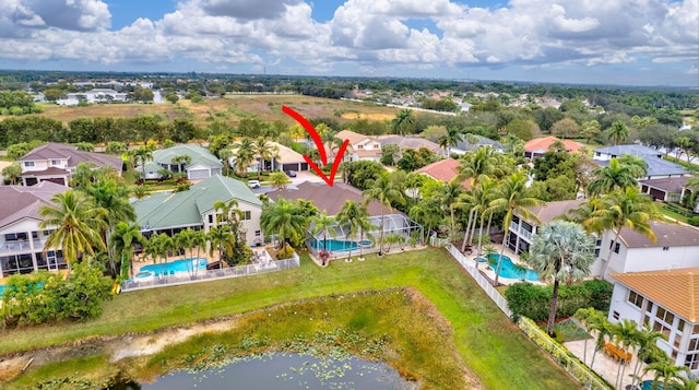 drone / aerial view featuring a water view