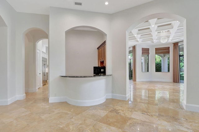 interior space featuring beam ceiling and coffered ceiling