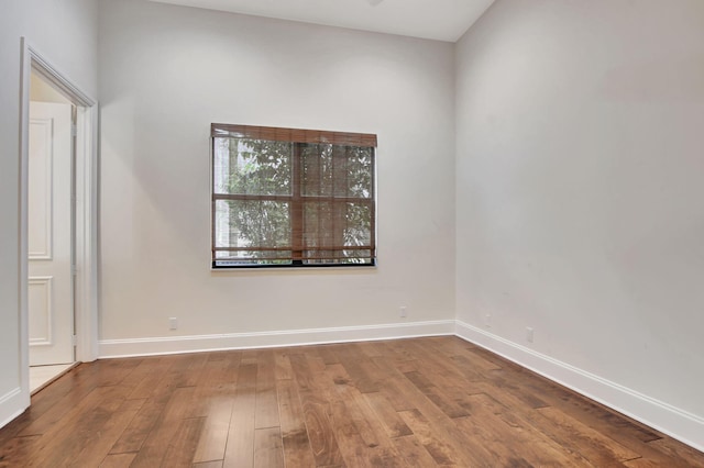 empty room featuring wood-type flooring