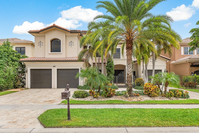 mediterranean / spanish-style house featuring a garage