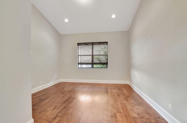 spare room featuring light hardwood / wood-style flooring