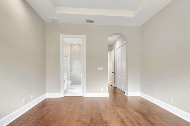 spare room featuring hardwood / wood-style flooring