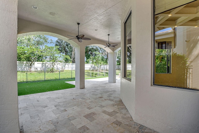 view of patio / terrace featuring ceiling fan