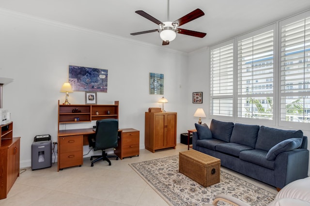 tiled home office with ornamental molding and ceiling fan