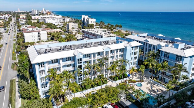 bird's eye view with a view of the beach and a water view