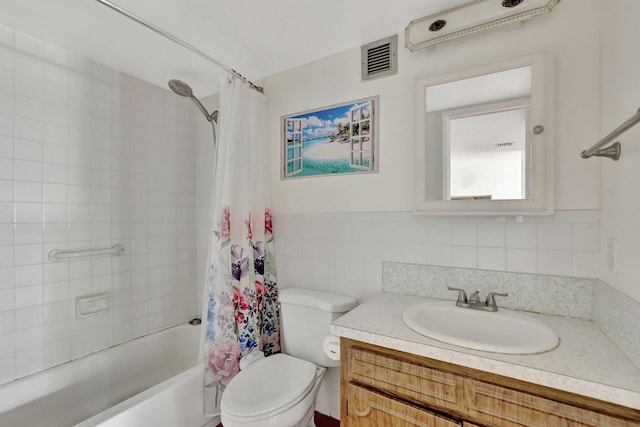 full bathroom featuring toilet, vanity, tile walls, backsplash, and shower / bathtub combination with curtain