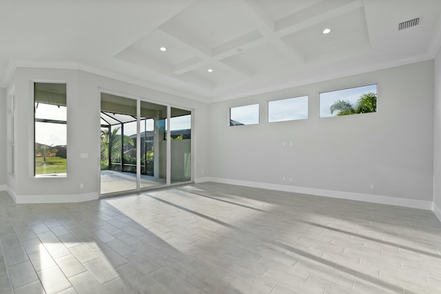 spare room with beamed ceiling, ornamental molding, coffered ceiling, and light hardwood / wood-style flooring