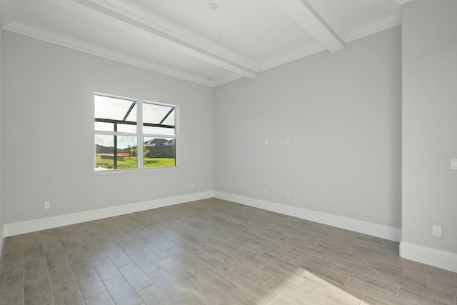 empty room with beamed ceiling