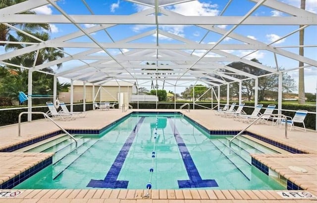 view of pool featuring a lanai and a patio area