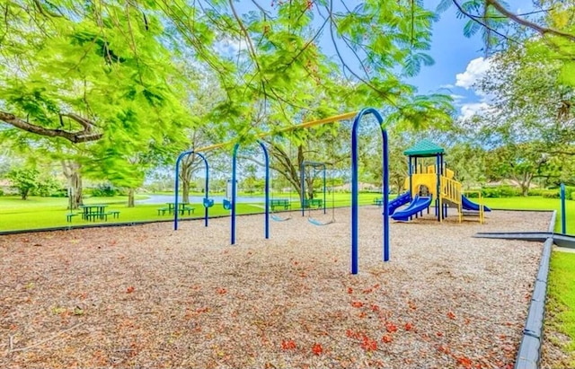 view of playground with a yard