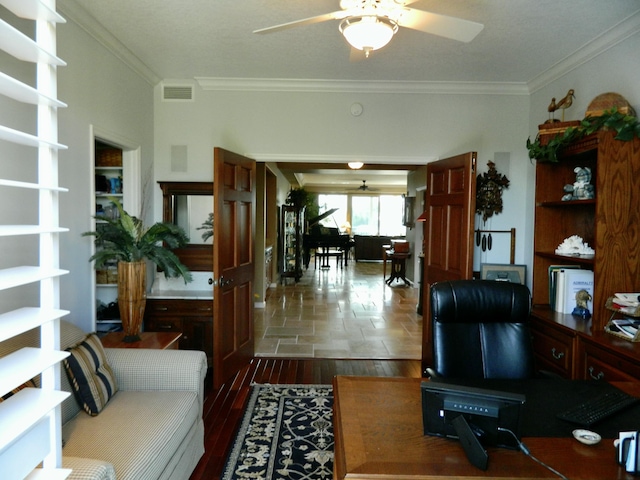 office area featuring crown molding and ceiling fan