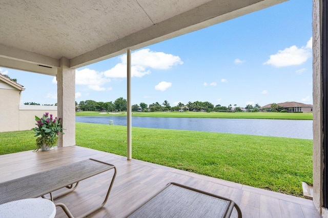 view of patio featuring a water view