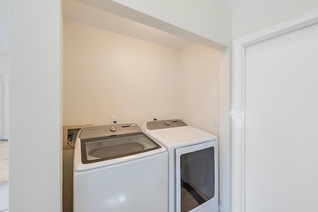 laundry area with washer and dryer