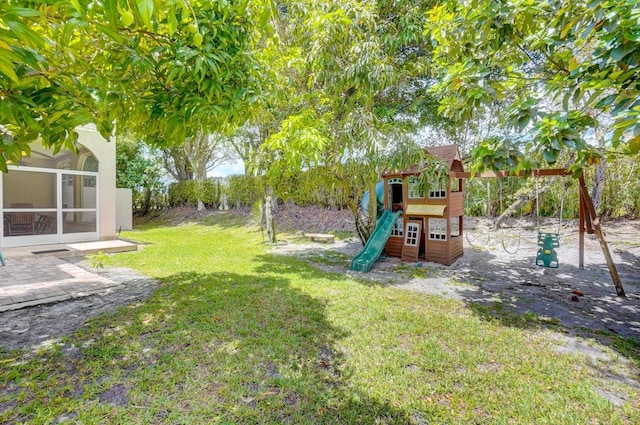 view of yard with a playground