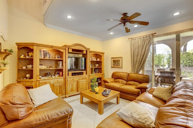 living room featuring ceiling fan, light tile patterned flooring, and crown molding