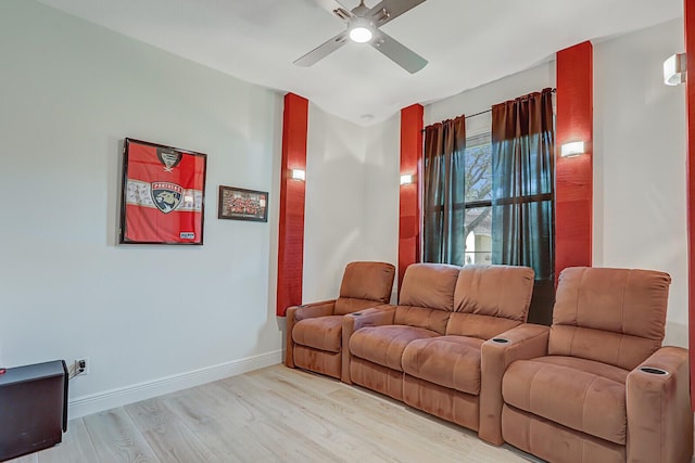 living room with ceiling fan and light hardwood / wood-style floors