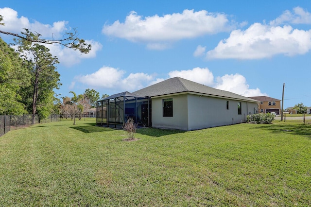 view of yard featuring a lanai