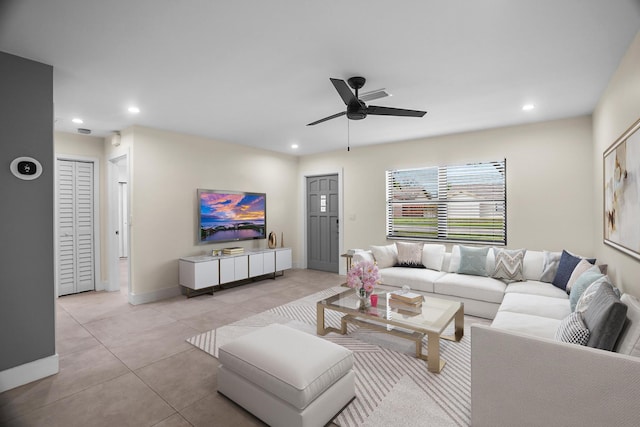 living room featuring ceiling fan