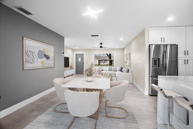 dining room featuring ceiling fan